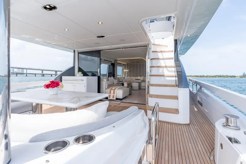 Slide: The Image of Luxurious 2022 Azimut 78 yacht interior with elegant seating and ocean view. - 22
