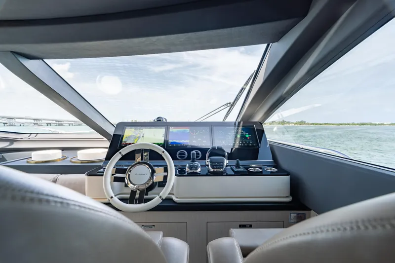 Slide: The Image of Luxurious 2022 Azimut 78 yacht helm with advanced navigation displays and sleek design. - 30