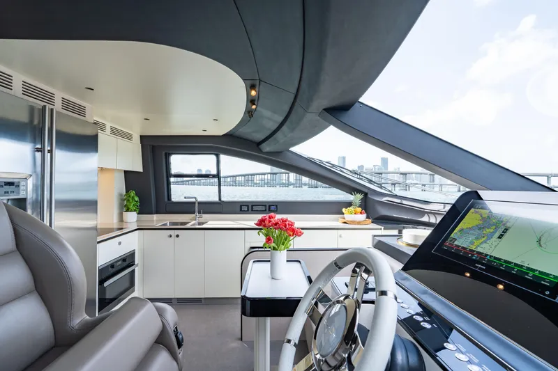 Slide: The Image of Luxurious interior of 2022 Azimut 78 yacht with modern kitchen and navigation system. - 31