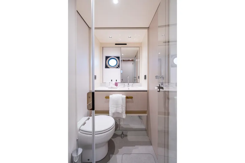 Slide: The Image of Luxurious bathroom in 2022 Azimut 78 yacht, featuring modern fixtures and elegant design. - 35