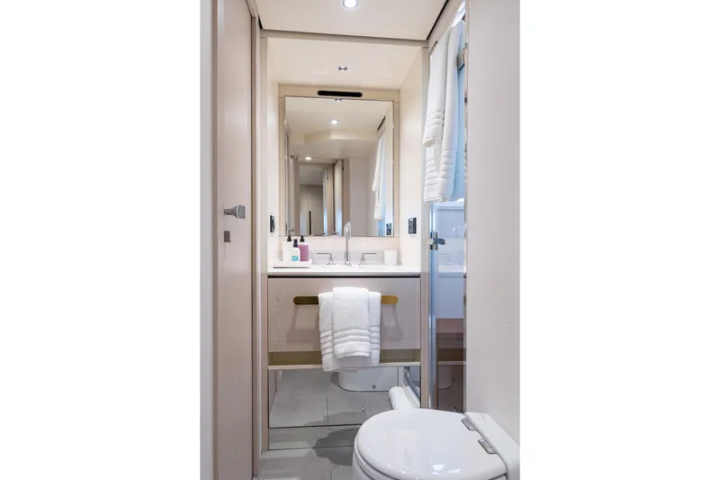 Slide: The Image of Luxurious bathroom in 2022 Azimut 78 yacht, featuring modern fixtures and elegant design. - 36