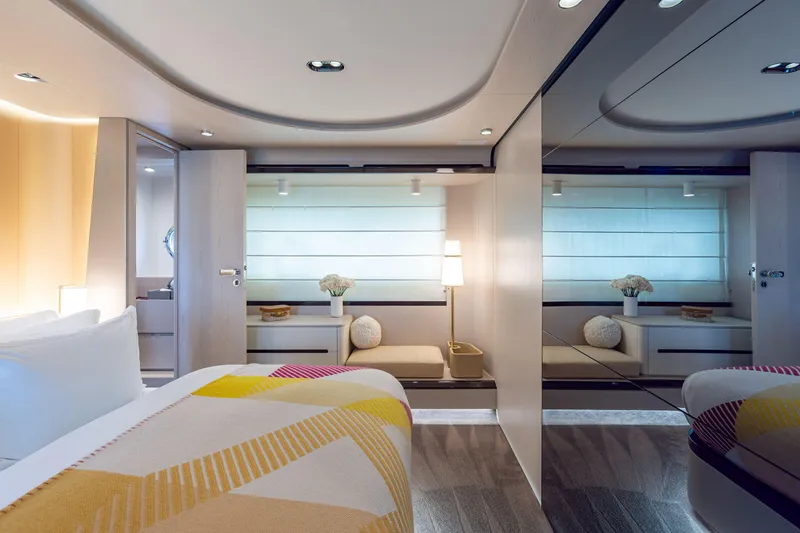 Slide: The Image of Luxurious interior of 2022 Azimut 78 yacht, featuring modern bedroom design and elegant decor. - 39