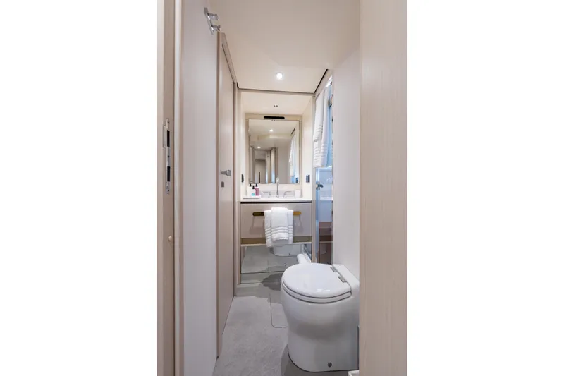 Slide: The Image of Luxurious bathroom interior of 2022 Azimut 78 yacht, featuring modern fixtures and elegant design. - 46