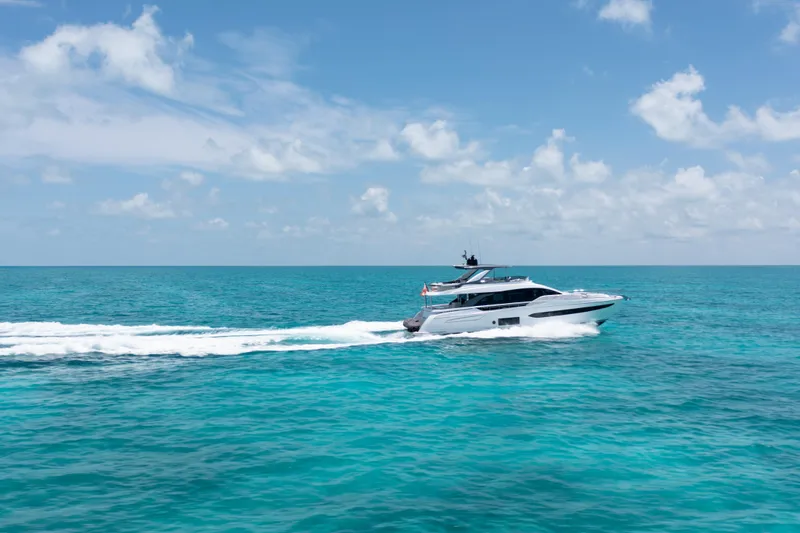 Slide: The Image of Luxury Azimut 78 yacht cruising on turquoise ocean under clear blue sky, 2022 model. - 6