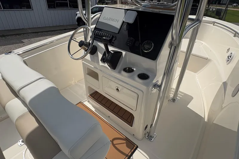 Slide: The Image of 2024 Bulls Bay 230 Center Console boat interior with Garmin navigation system. - 10