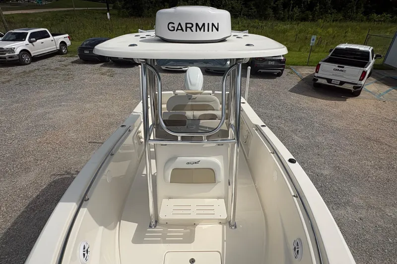 Slide: The Image of 2024 Bulls Bay 230 Center Console boat with Garmin equipment, parked outdoors. - 16