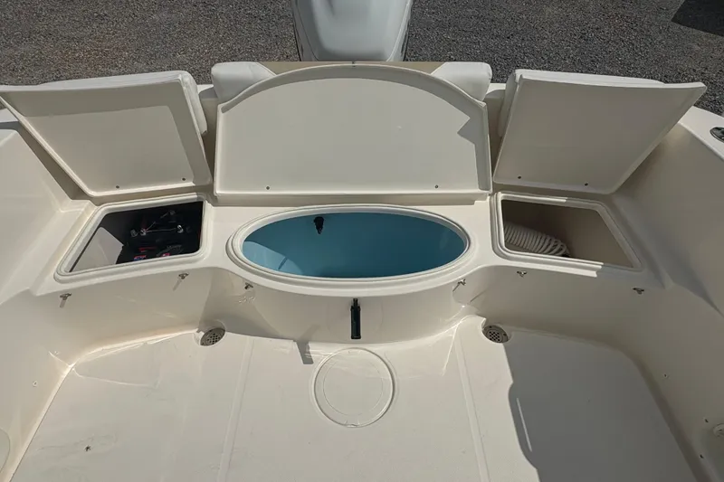 Slide: The Image of 2024 Bulls Bay 230 Center Console boat storage compartments and livewell. - 20
