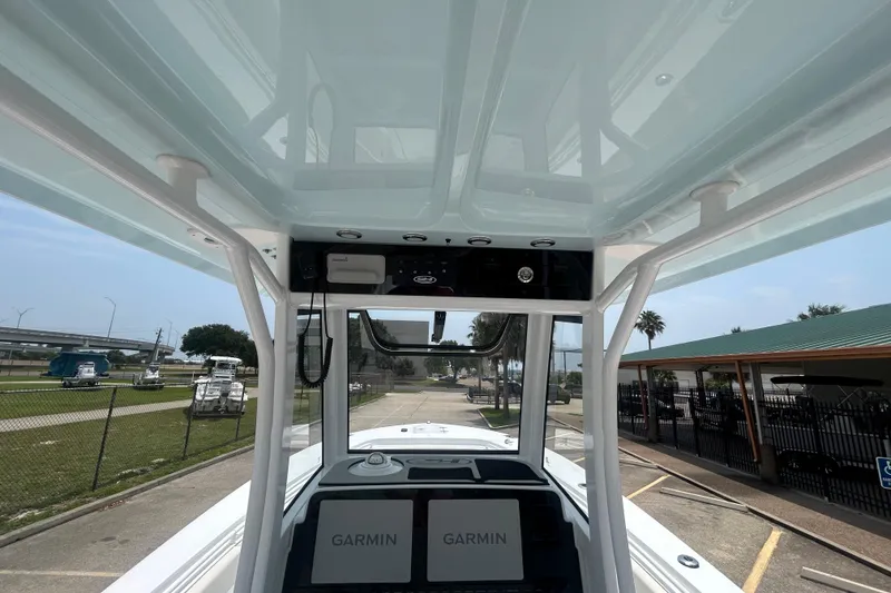Slide: The Image of 2026 Sea Hunt Gamefish 27 Coffin Box boat interior with Garmin navigation system. - 10