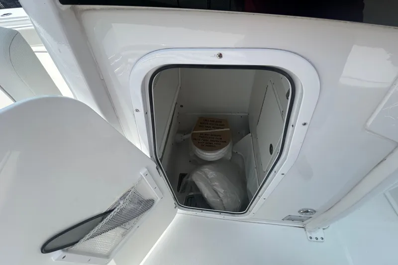 Slide: The Image of Storage compartment on a 2026 Sea Hunt Gamefish 27 Coffin Box boat. - 24