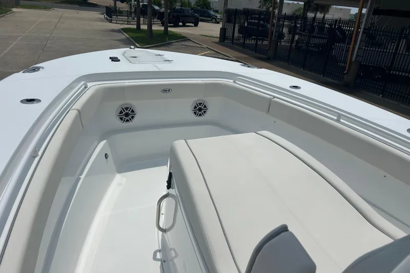 Slide: The Image of 2026 Sea Hunt Gamefish 27 Coffin Box boat interior with seating and speakers. - 6
