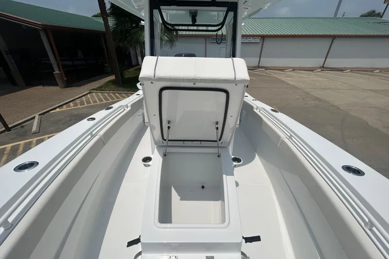 Slide: The Image of 2026 Sea Hunt Gamefish 27 Coffin Box, open storage compartment, sleek white design. - 9