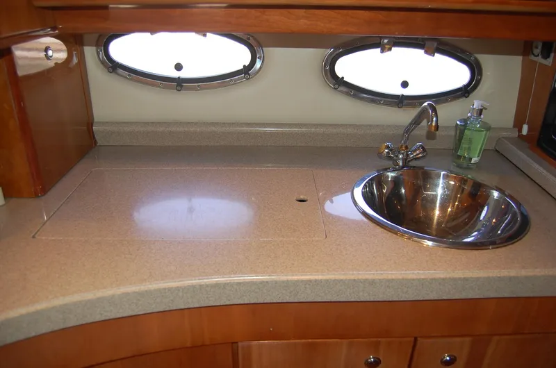 Slide: The Image of Galley area of the 2002 Regal Commodore 4260 yacht. - 14