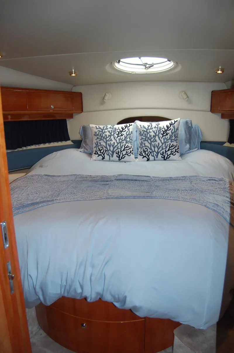 Slide: The Image of Luxurious bedroom in Regal Commodore 4260 yacht, year 2002. - 17