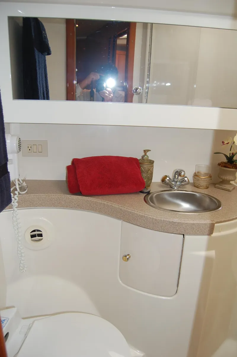 Slide: The Image of Bathroom in Regal Commodore 4260 boat, year 2002. - 22
