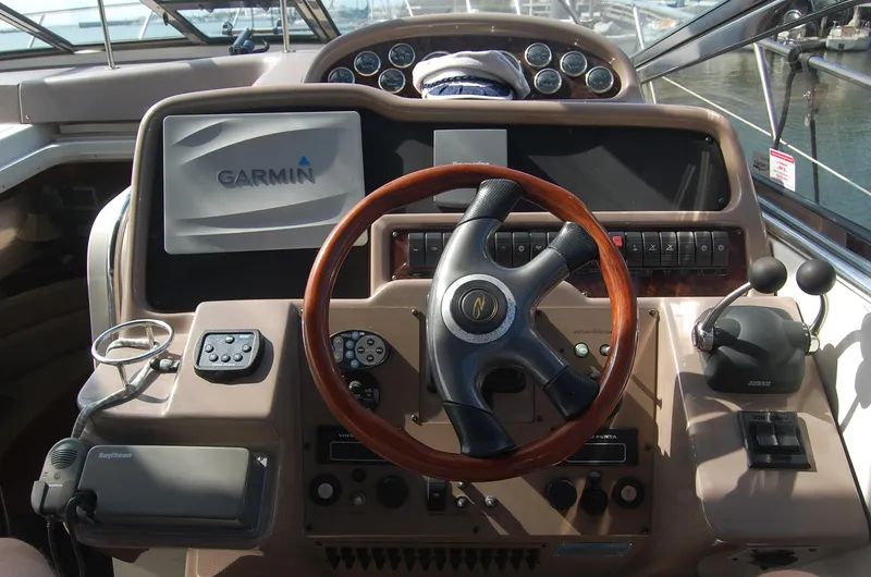 Slide: The Image of Helm of 2002 Regal Commodore 4260 yacht with Garmin navigation system. - 33