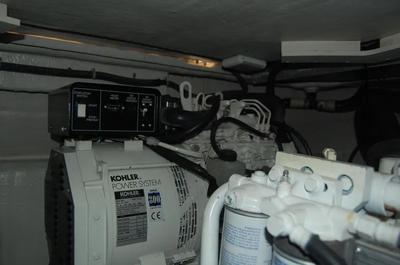Slide: The Image of Engine room of 2002 Regal Commodore 4260 with Kohler generator. - 45