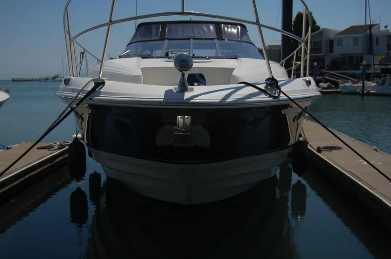 Slide: The Image of 2002 Regal Commodore 4260 yacht docked in harbor. - 46