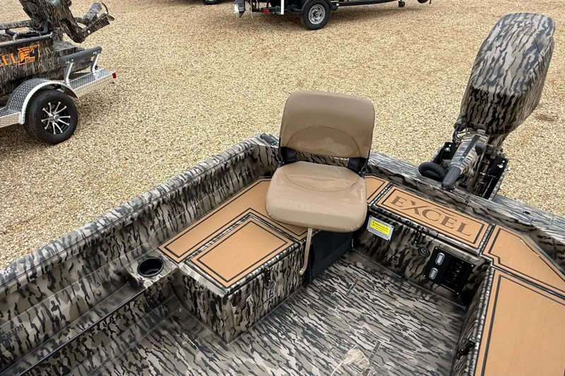Slide: The Image of 2026 Excel 1860 Viper F4 boat interior with camouflage design and seating. - 15