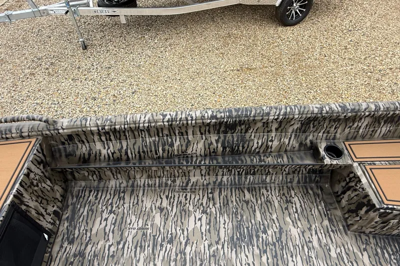 Slide: The Image of 2026 Excel 1860 Viper F4 boat interior with camouflage pattern and trailer. - 16