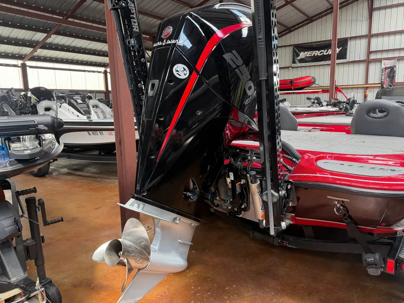 Slide: The Image of Falcon T20TE 2022 boat with powerful outboard motor in warehouse. - 21