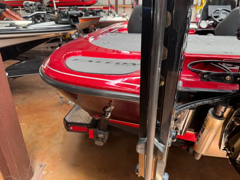 Slide: The Image of Red Falcon T20TE boat from 2022 in a workshop. - 23
