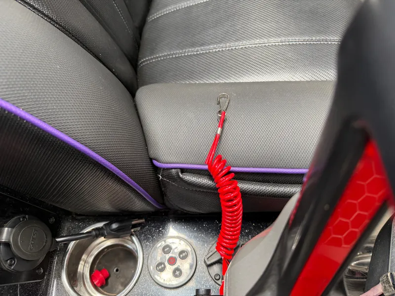 Slide: The Image of Interior of a 2024 Skeeter FXR20 with safety lanyard. - 17