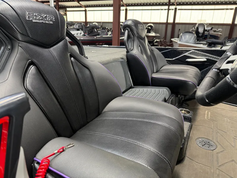 Slide: The Image of Interior of 2024 Skeeter FXR20 boat with luxurious seating. - 18