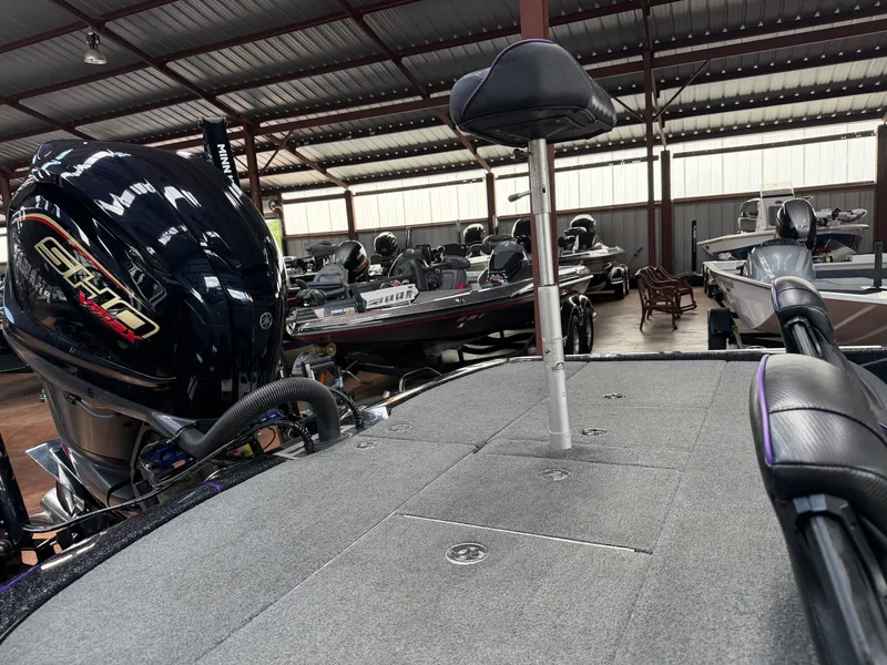Slide: The Image of 2024 Skeeter FXR20 boat in warehouse with Yamaha engine. - 19