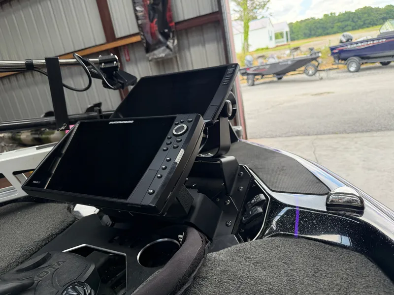 Slide: The Image of 2024 Skeeter FXR20 boat with advanced navigation system. - 6