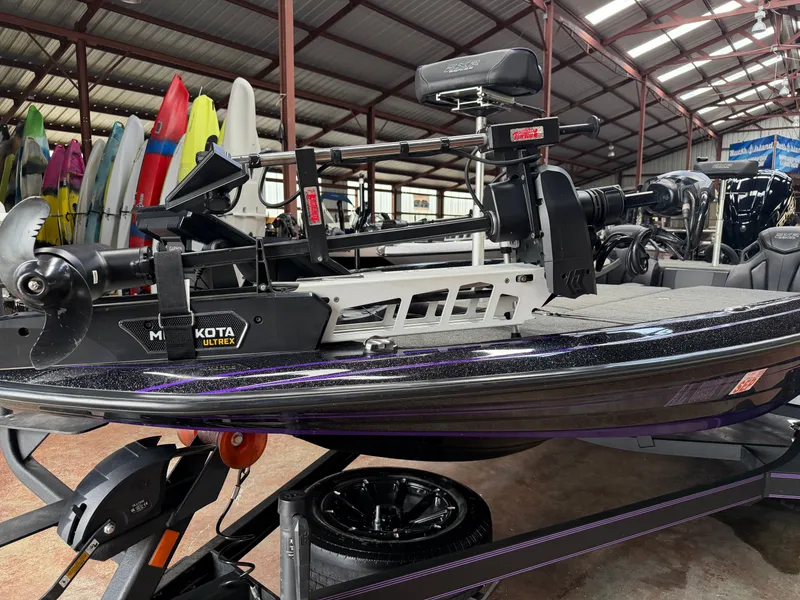 Slide: The Image of 2024 Skeeter FXR20 boat with Minn Kota Ultrex motor in warehouse. - 9