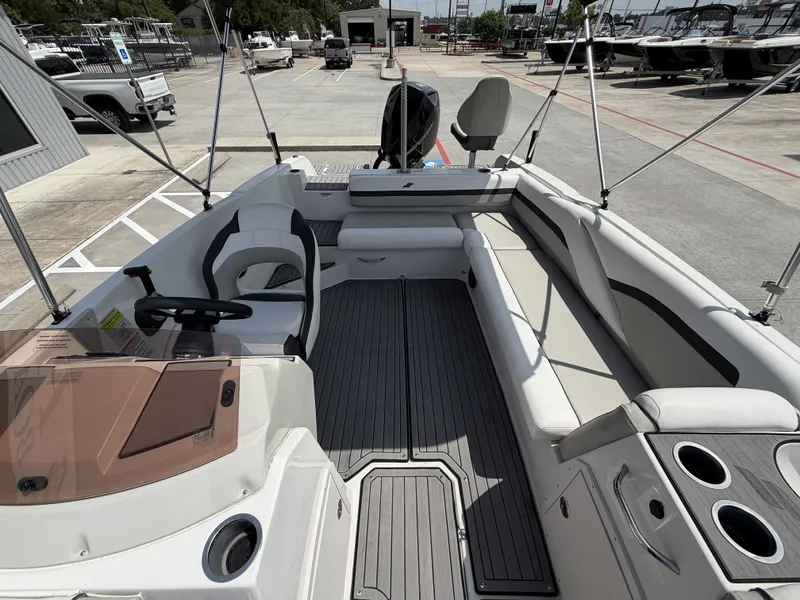 Slide: The Image of Interior of a 2023 Starcraft SXV-211 boat with seating area. - 29