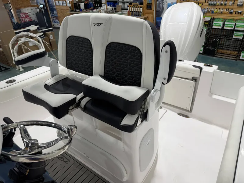 Slide: The Image of Interior of 2026 Tidewater 232 CC Adventure boat with dual seating. - 6
