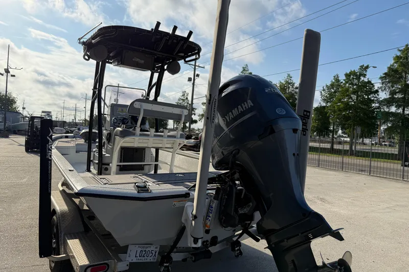 Slide: The Image of 2022 Avid 23 FS Magnum boat with Yamaha engine on trailer. - 5