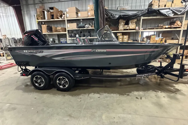The Image of 2024 Ranger VX1888 WT boat in warehouse, side view with trailer. - 0