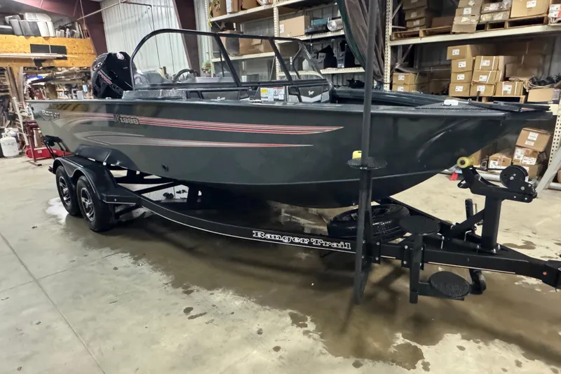Slide: The Image of 2024 Ranger VX1888 WT boat in warehouse, on trailer, side view. - 2