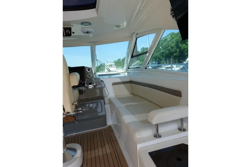 Slide: The Image of Interior of 2012 Sea Ray Sundancer 540 yacht with seating and helm station. - 1