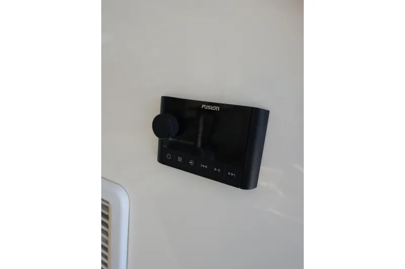 Slide: The Image of Fusion audio control panel on 2012 Sea Ray Sundancer 540 yacht interior. - 22