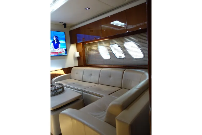 Slide: The Image of Luxurious interior of 2012 Sea Ray Sundancer 540 yacht with plush seating and TV. - 28