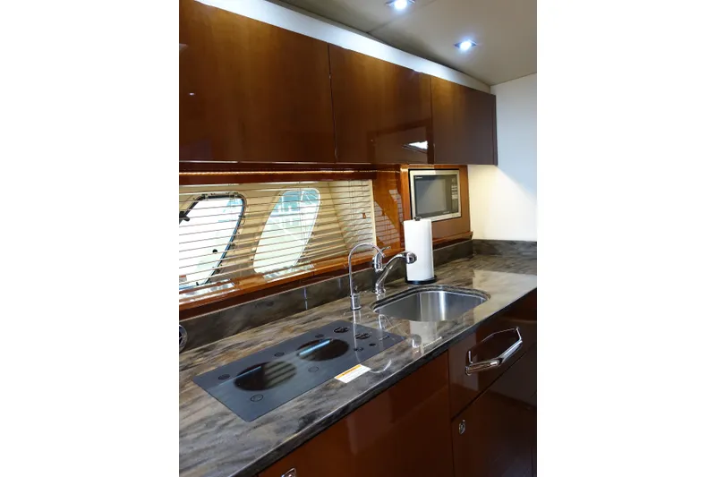 Slide: The Image of Luxurious kitchen interior of 2012 Sea Ray Sundancer 540 yacht with modern amenities. - 30