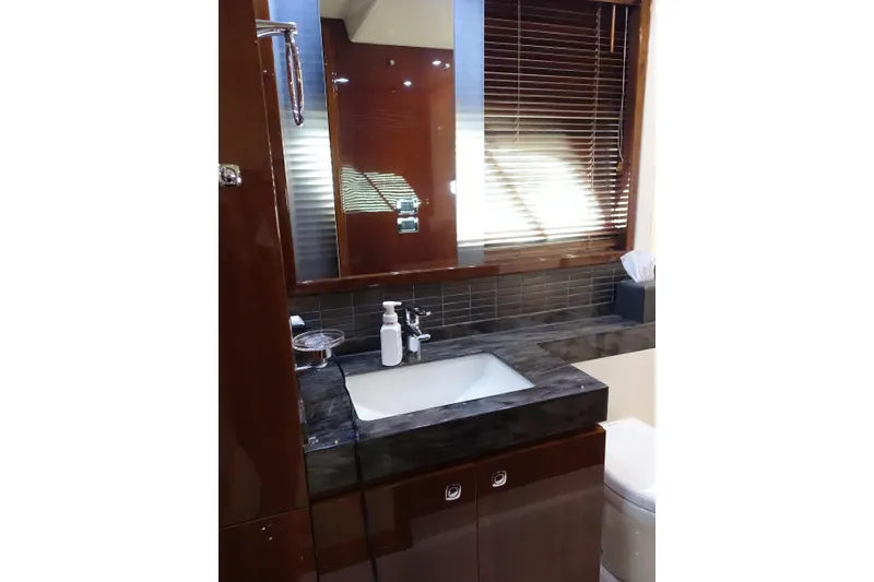 Slide: The Image of Luxurious bathroom interior of 2012 Sea Ray Sundancer 540 yacht with modern fixtures. - 33