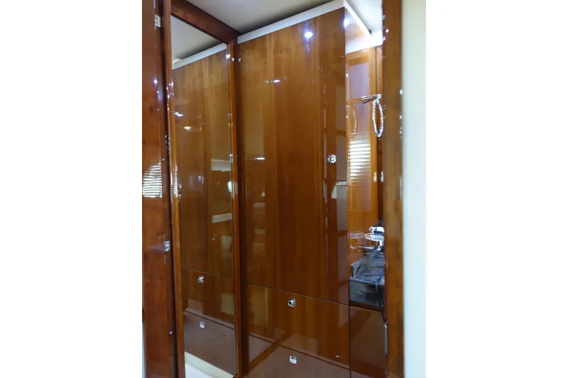 Slide: The Image of Luxurious wooden cabinetry in 2012 Sea Ray Sundancer 540 yacht interior. - 36
