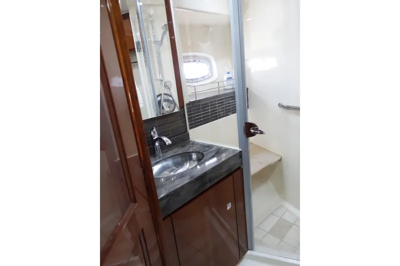 Slide: The Image of Luxurious bathroom in 2012 Sea Ray Sundancer 540 yacht with modern fixtures and shower. - 44