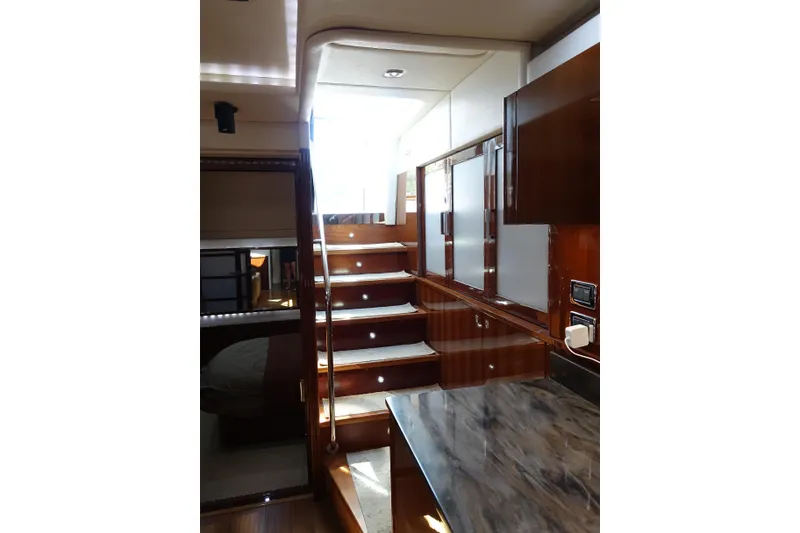 Slide: The Image of Luxurious interior of 2012 Sea Ray Sundancer 540 yacht with polished wood and modern design. - 47