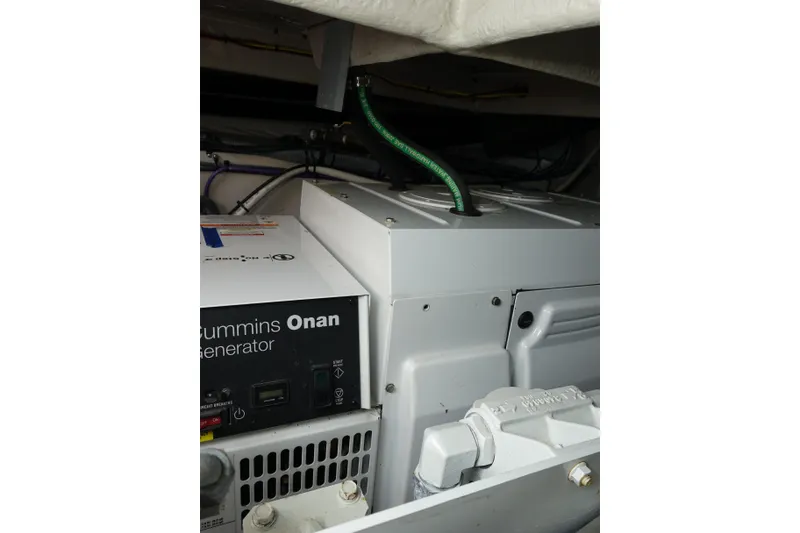 Slide: The Image of Engine room of 2012 Sea Ray Sundancer 540 with Cummins Onan generator. - 48