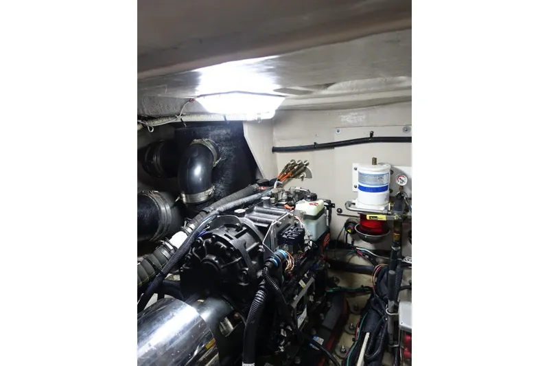 Slide: The Image of Engine room of 2012 Sea Ray Sundancer 540 yacht, showcasing mechanical components. - 50
