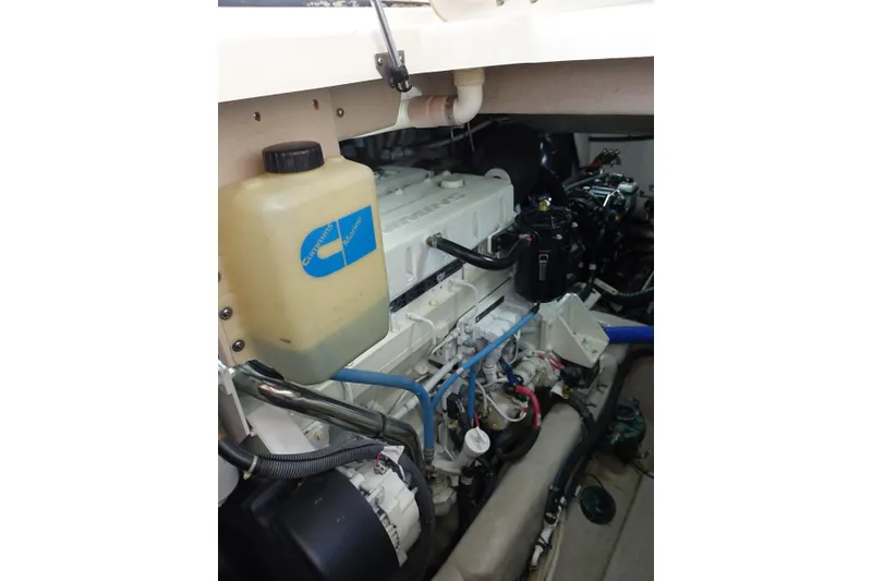 Slide: The Image of Engine compartment of 2012 Sea Ray Sundancer 540 with Cummins Marine components. - 52