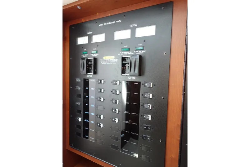 Slide: The Image of Electrical panel on 2012 Sea Ray Sundancer 540 yacht, featuring 240VAC and 120VAC controls. - 55