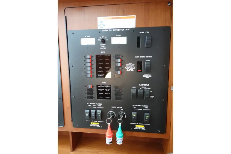 Slide: The Image of Electrical control panel on a 2012 Sea Ray Sundancer 540 yacht. - 56