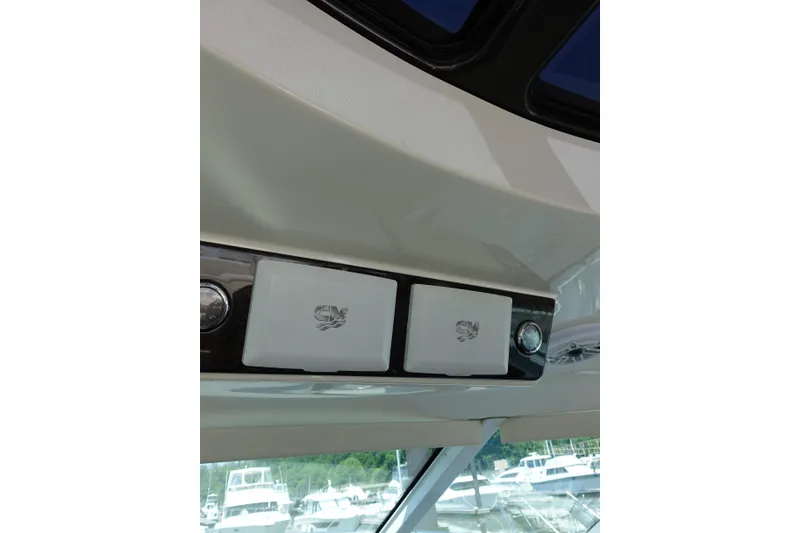 Slide: The Image of Interior view of 2012 Sea Ray Sundancer 540 yacht dashboard controls. - 7