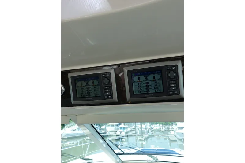 Slide: The Image of Control panel of a 2012 Sea Ray Sundancer 540 yacht, displaying navigation data. - 8